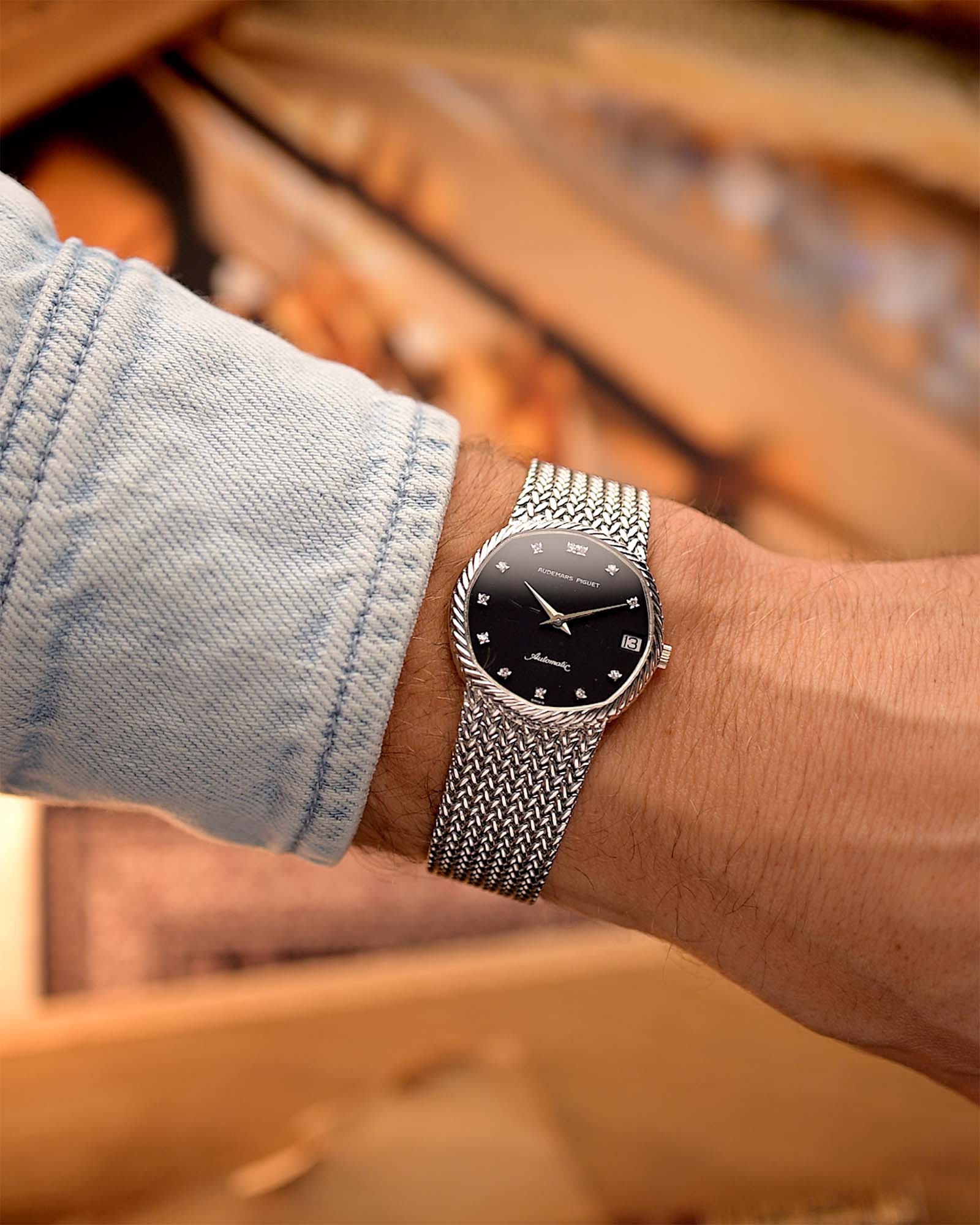 Vintage Audemars Piguet Watch 18k Automatic Black Diamond from the 1970s on a wrist.