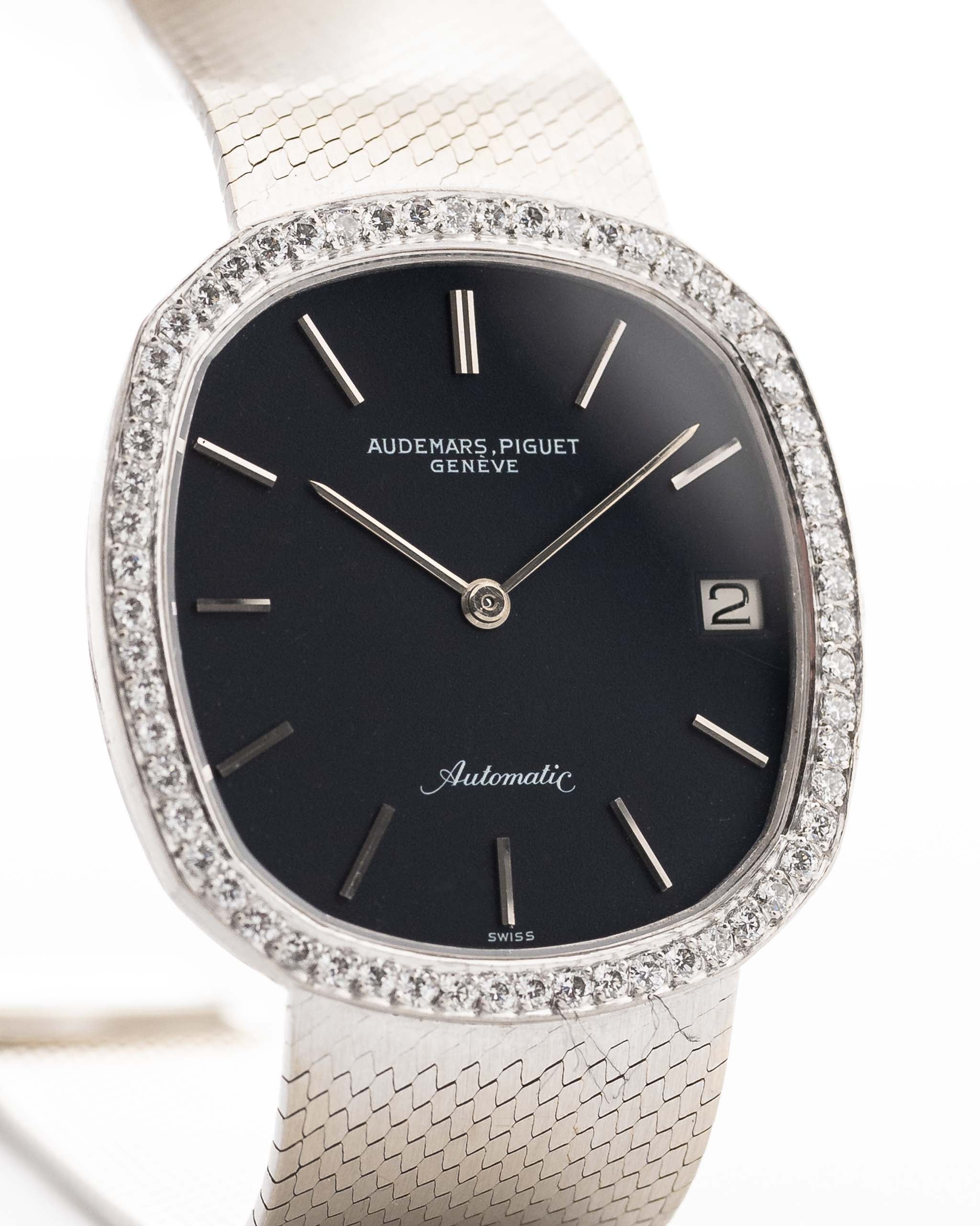 Closeup Photo of a vintage Audemars Piguet Ellipse 18k Diamond Black from the 1970s. 33mm case in 18k White Gold with Automatic Cal. 2121, Flawless Original Black Dial, 60 Diamonds and Adjustable Bracelet.