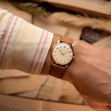 Close-up photo of aVintage IWC Cal. 401 Dress Watch R1205 18k from 1964 on a wrist.