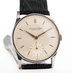 Vintage IWC Cal. 83 Sub Second Watch with a black leather strap against a white background. 32mm wide, Stainless Steel case with Manual Cal. 83 movement, Silver dial and Black Leather Strap.