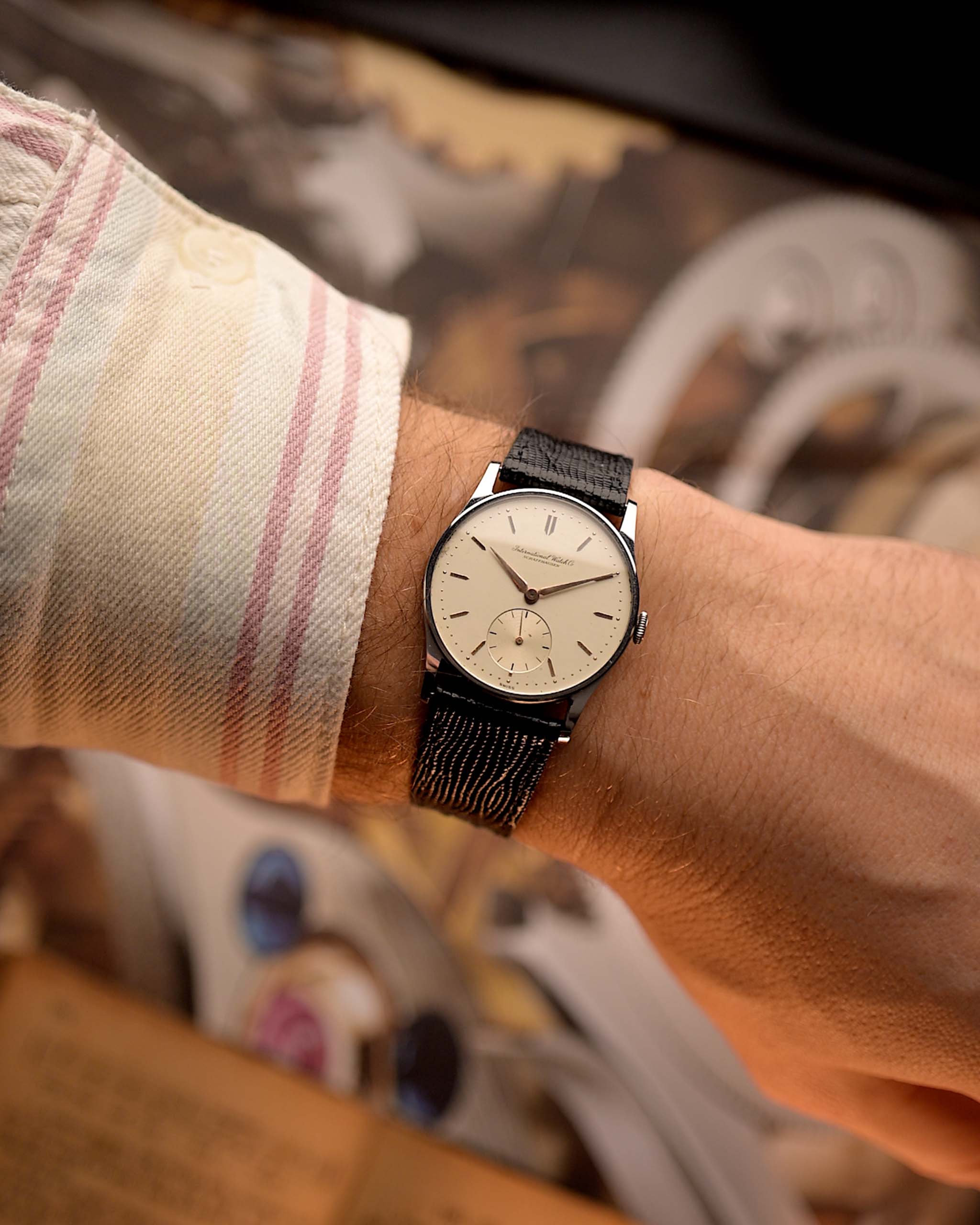 Vintage IWC Cal. 83 Sub Second Watch from 1940 on a wrist with a black leather strap.