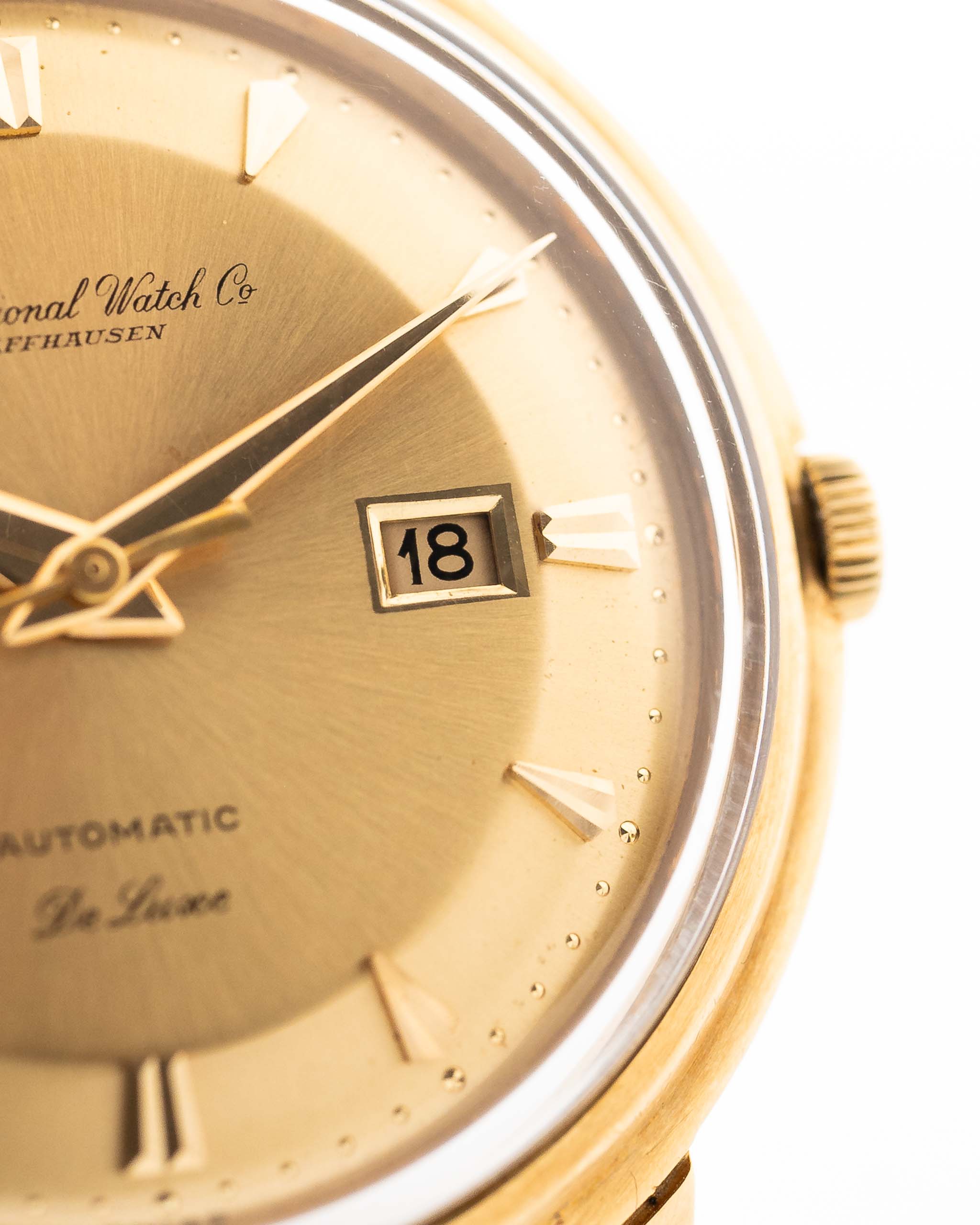 Closeup of a Vintage IWC de Luxe automatic 18k 1959 Dial. 35mm with 18k Yellow Gold Case, Automatic Caliber 8531, flawless Pie Pan Dial and Leather Strap.