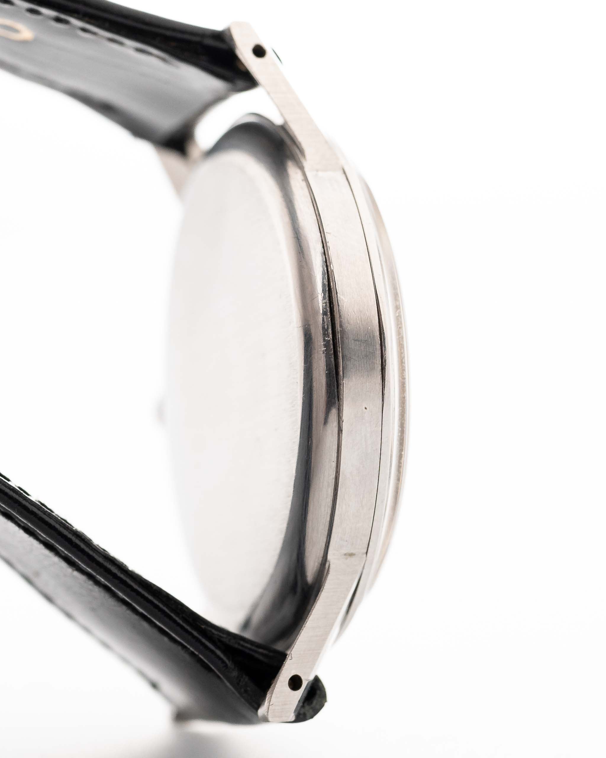 Closeup Photo of a Omega Jumbo 2272 Sub Second Steel Rose from 1952. 38mm in Stainless Steel with Manual wind movement, Original champagne dial and Original leather strap.