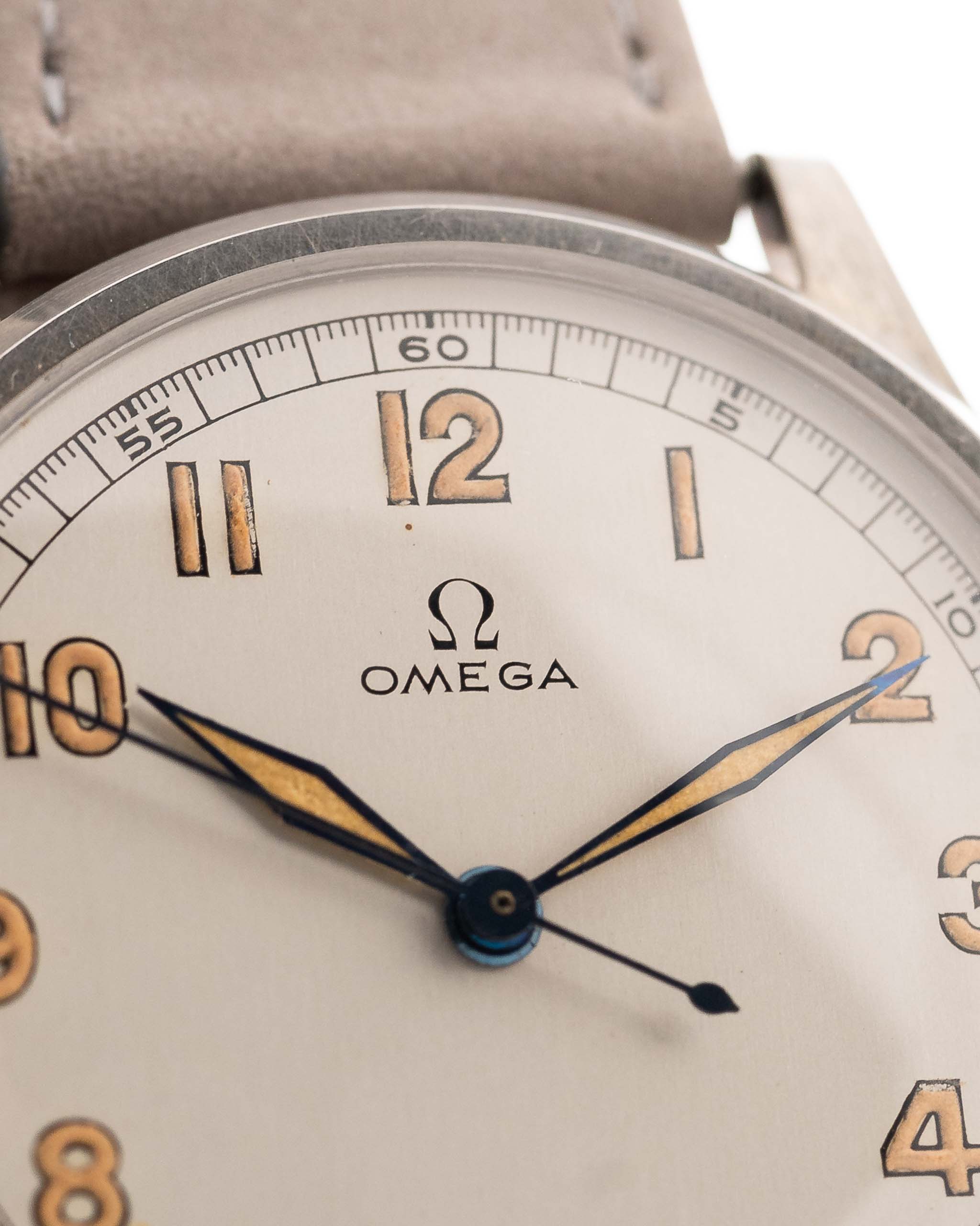 Closeup of a Vintage Omega Jumbo Radium from 1935 Silver Railroad Dial. 37.5mm with Stainless Steel Case, Manual Wind Movement, Original Silver Railroad Dial and Leather Strap.