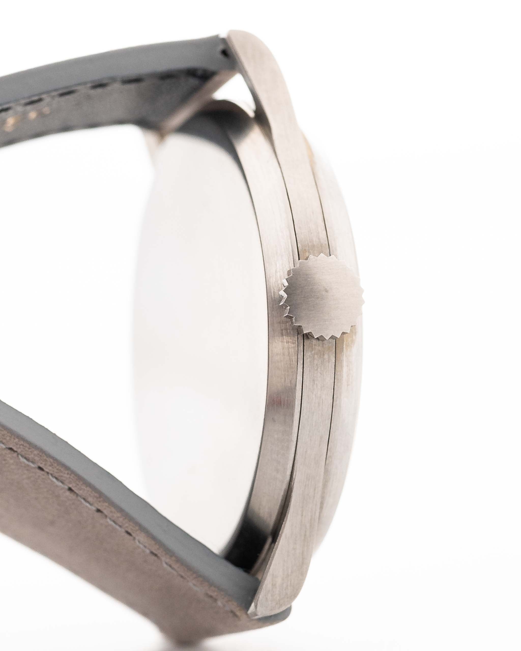Closeup of a Vintage Omega Jumbo Radium from 1935 Case. 37.5mm with Stainless Steel Case, Manual Wind Movement, Original Silver Railroad Dial and Leather Strap.