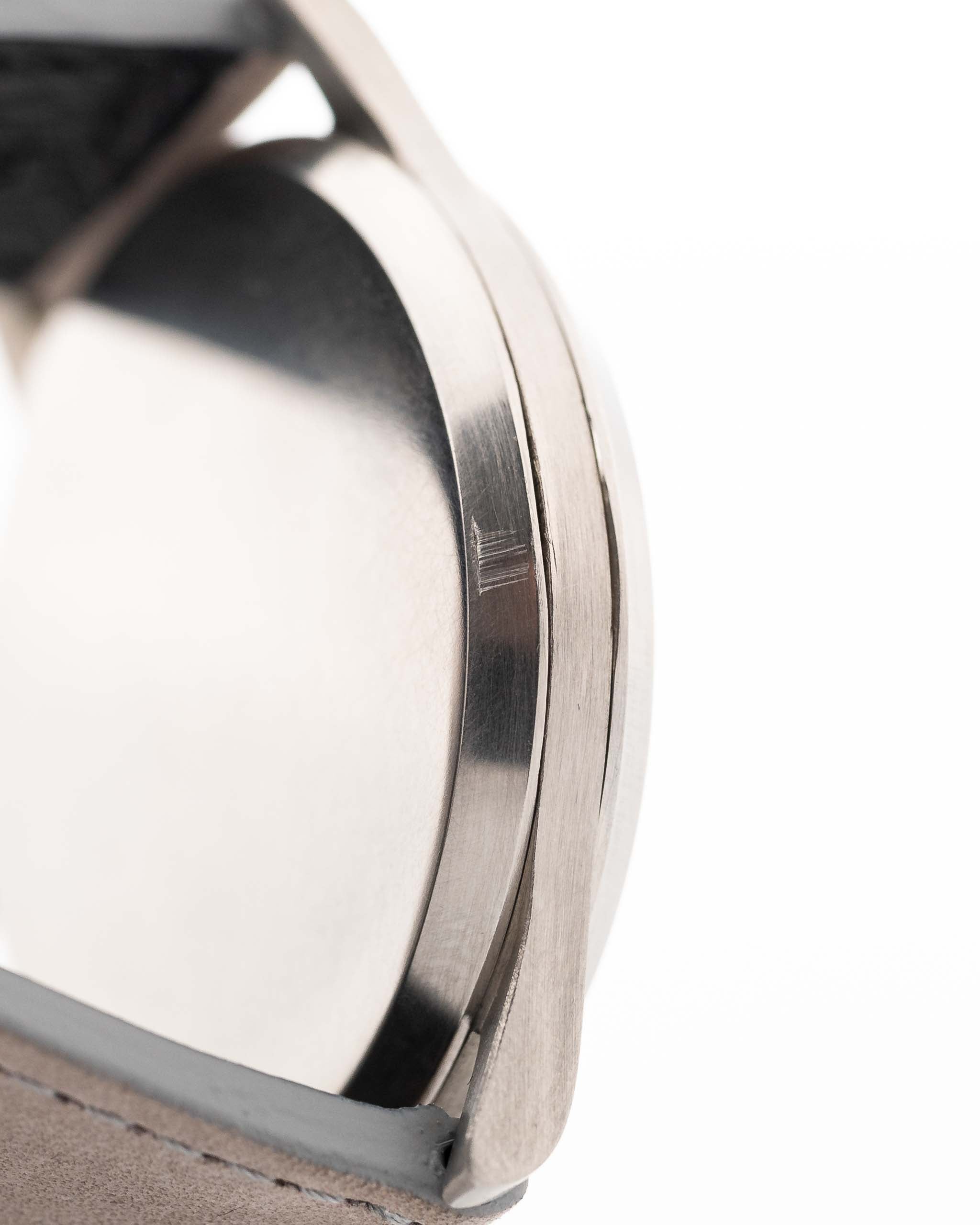 Closeup of a Vintage Omega Jumbo Radium from 1935 Case. 37.5mm with Stainless Steel Case, Manual Wind Movement, Original Silver Railroad Dial and Leather Strap.