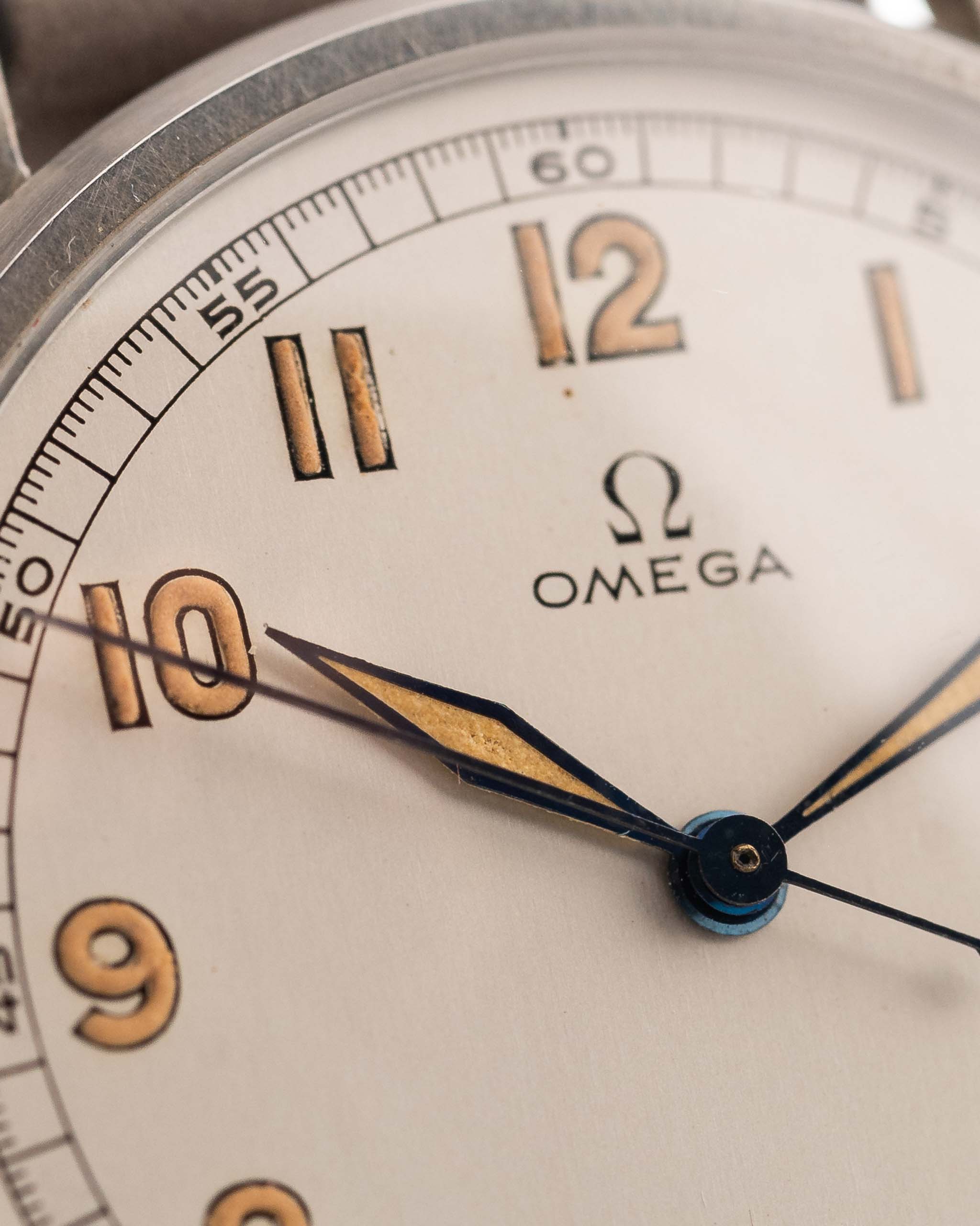 Closeup of a Vintage Omega Jumbo Radium from 1935 Silver Railroad Dial. 37.5mm with Stainless Steel Case, Manual Wind Movement, Original Silver Railroad Dial and Leather Strap.