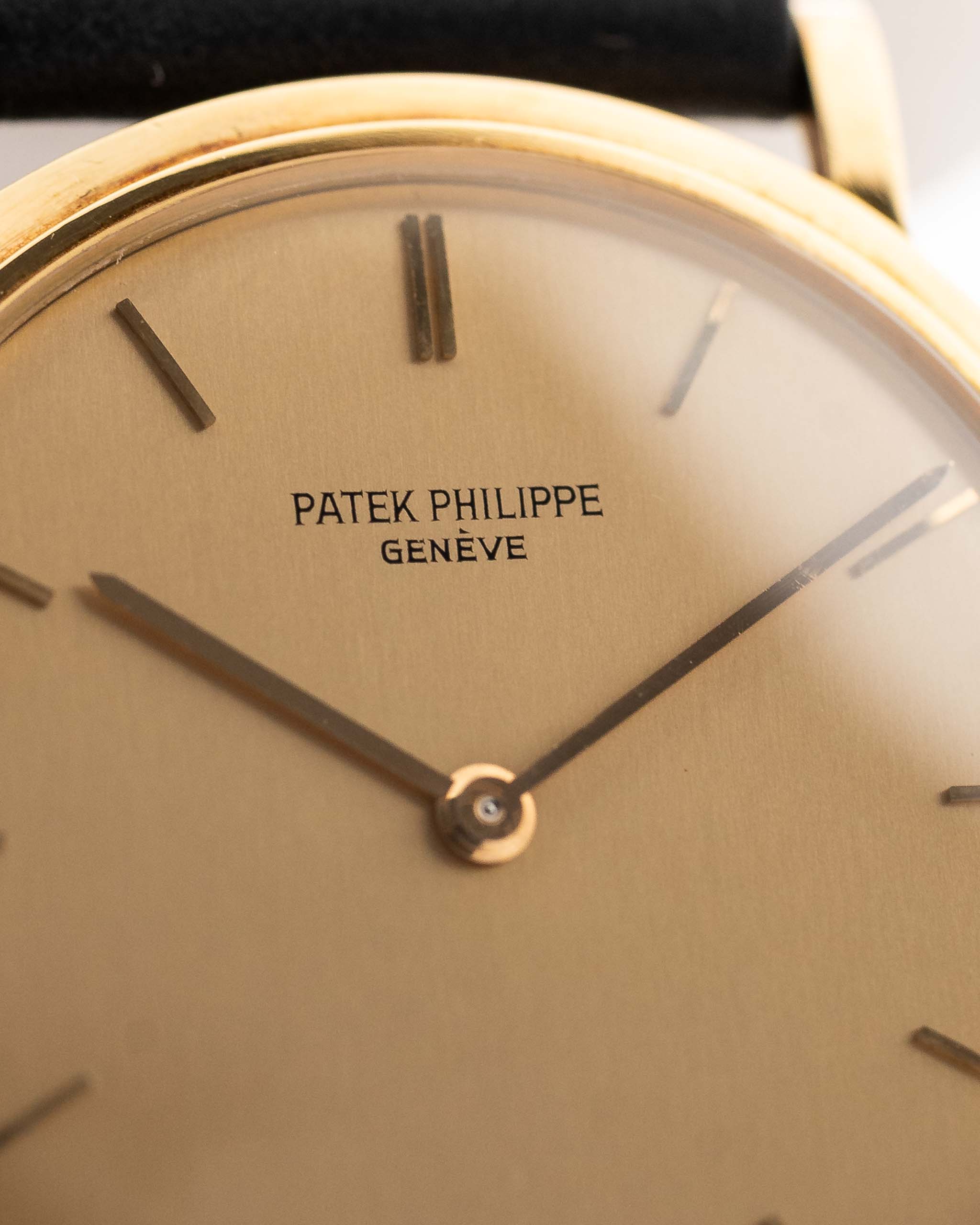 Patek Philippe 3520 Calatrava Ref. 3520 from the 1960s. 32mm in 18k Yellow Gold with Manual Wind Movement, Original Golden Brushed Dial and Leather Strap.