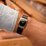 Vintage Piaget Tonneau Watch 9251 Onyx from the 1970s on a wrist.