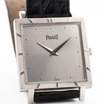 Closeup Photo of a Piaget Protocole 927 18k White Gold from the 1970s. 25mm in 18k White Gold with Manual wind movement, Silver sunburst dial and Original black leather strap.