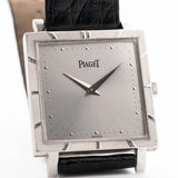 Closeup Photo of a Piaget Protocole 927 18k White Gold from the 1970s. 25mm in 18k White Gold with Manual wind movement, Silver sunburst dial and Original black leather strap.