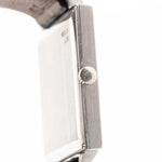 Closeup Photo of a Piaget Protocole 927 18k White Gold from the 1970s. 25mm in 18k White Gold with Manual wind movement, Silver sunburst dial and Original black leather strap.