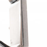 Closeup Photo of a Piaget Protocole 927 18k White Gold from the 1970s. 25mm in 18k White Gold with Manual wind movement, Silver sunburst dial and Original black leather strap.