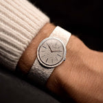 Vintage Piaget Ellipse 9821 Watch Bark White Gold from the 1970s on a wrist. 24mm in 18k White Gold with Bark-finished dial, Manual wind Cal. 9P1, 18k bracelet in Unpolished great condition.