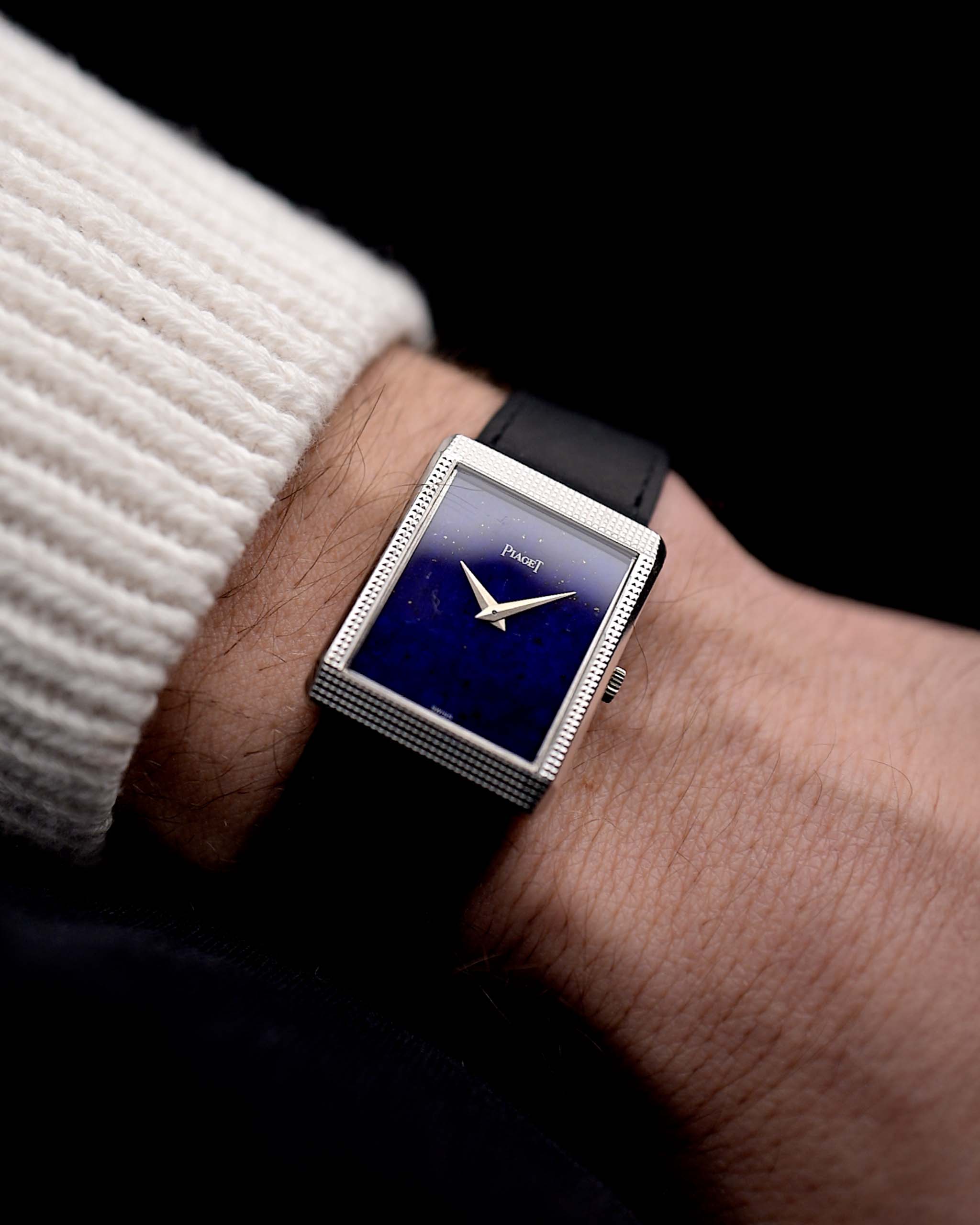Photo of a Piaget Protocole 9151 Lapizlazuli 18k Hobnail from the 1970s on a wrist. 
23mm case 18k White Gold Case with Manual Wind Movement and Original Lapislazuli Dial with Leather Strap.