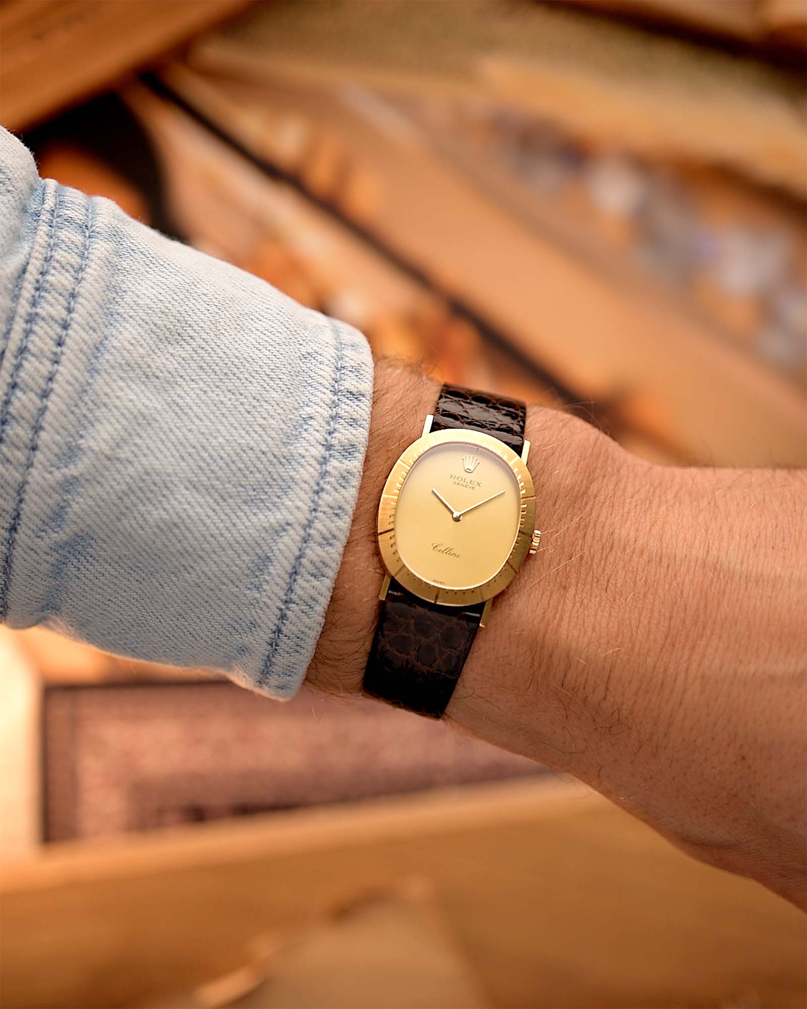 Rolex Cellini 4056 Ellipse from 1981 on a wrist. 27.5mm with 18k Yellow Gold, Caliber 1601 in Flawless Golden sunburst dial with Original leather strap.