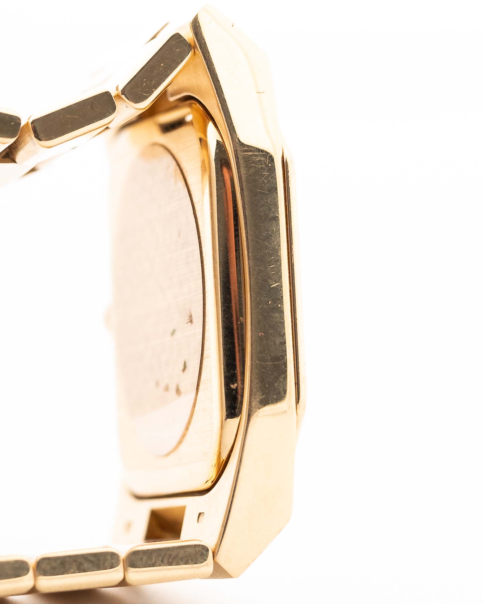 Closeup Photo of a Rolex Cellini 4350 Octagon 18k Silver Dial from 1981 on a wrist. 27mm in 18k Yellow Gold with Manual Wind Movement, Flawless Horizontal Brushed Dial and President Bracelet.