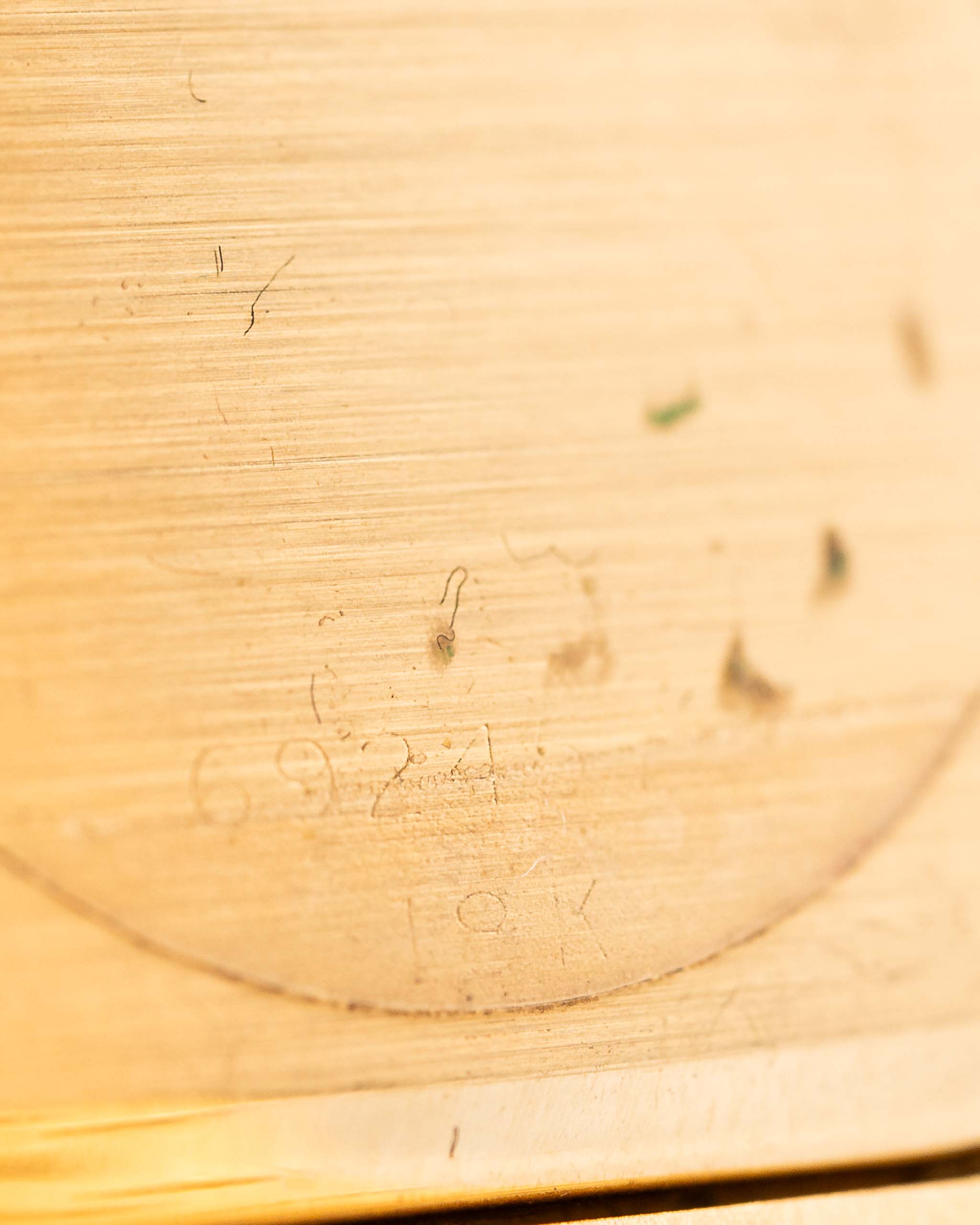 Closeup Photo of a Rolex Cellini 4350 Octagon 18k Silver Dial from 1981 on a wrist. 27mm in 18k Yellow Gold with Manual Wind Movement, Flawless Horizontal Brushed Dial and President Bracelet.