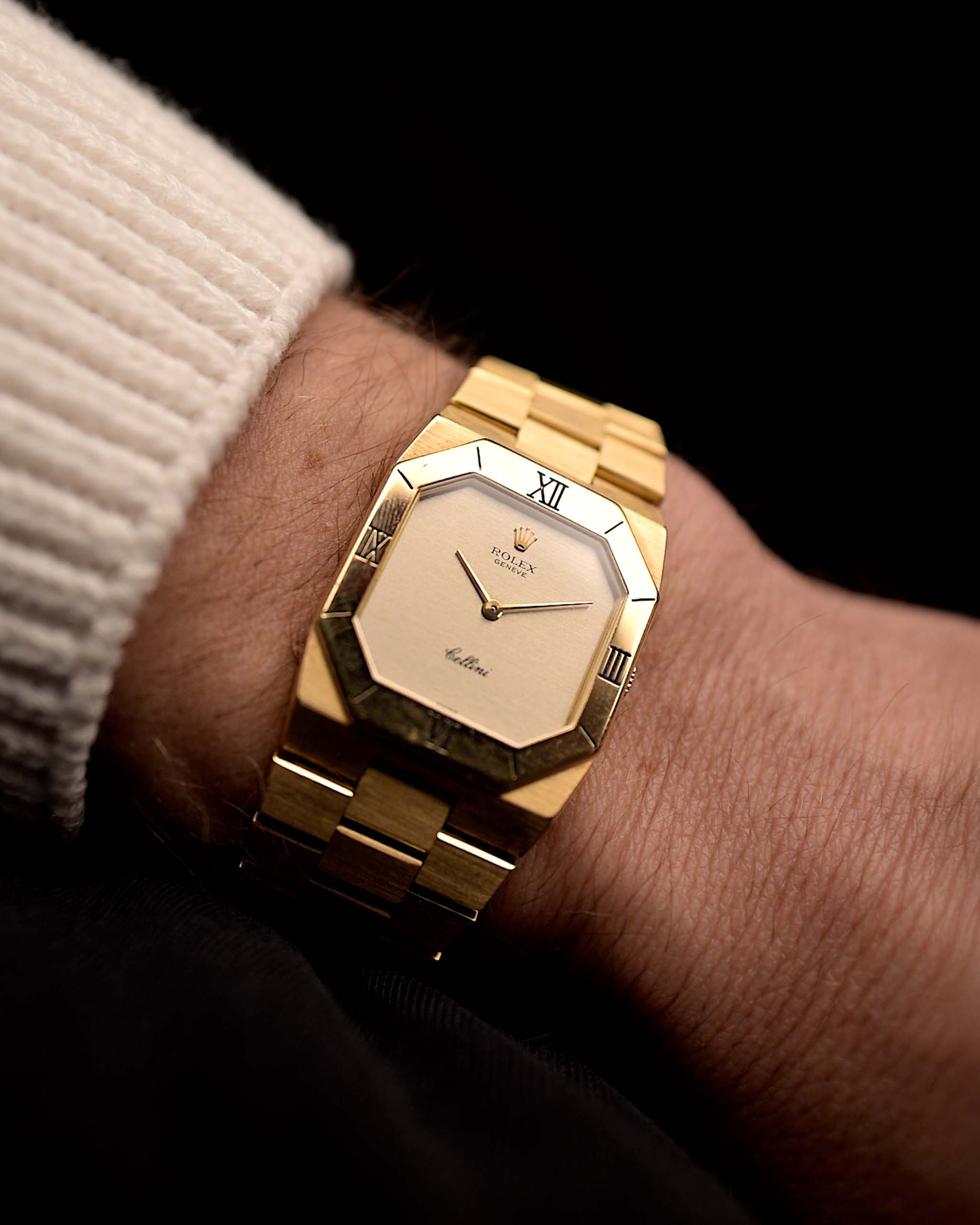 Photo of a  Rolex Cellini 4350 Octagon 18k Silver Dial from 1981 on a wrist. 27mm in 18k Yellow Gold with Manual Wind Movement, Flawless Horizontal Brushed Dial and President Bracelet.
