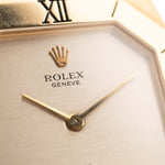 Closeup Photo of a Rolex Cellini 4350 Octagon 18k Silver Dial from 1981 on a wrist. 27mm in 18k Yellow Gold with Manual Wind Movement, Flawless Horizontal Brushed Dial and President Bracelet.