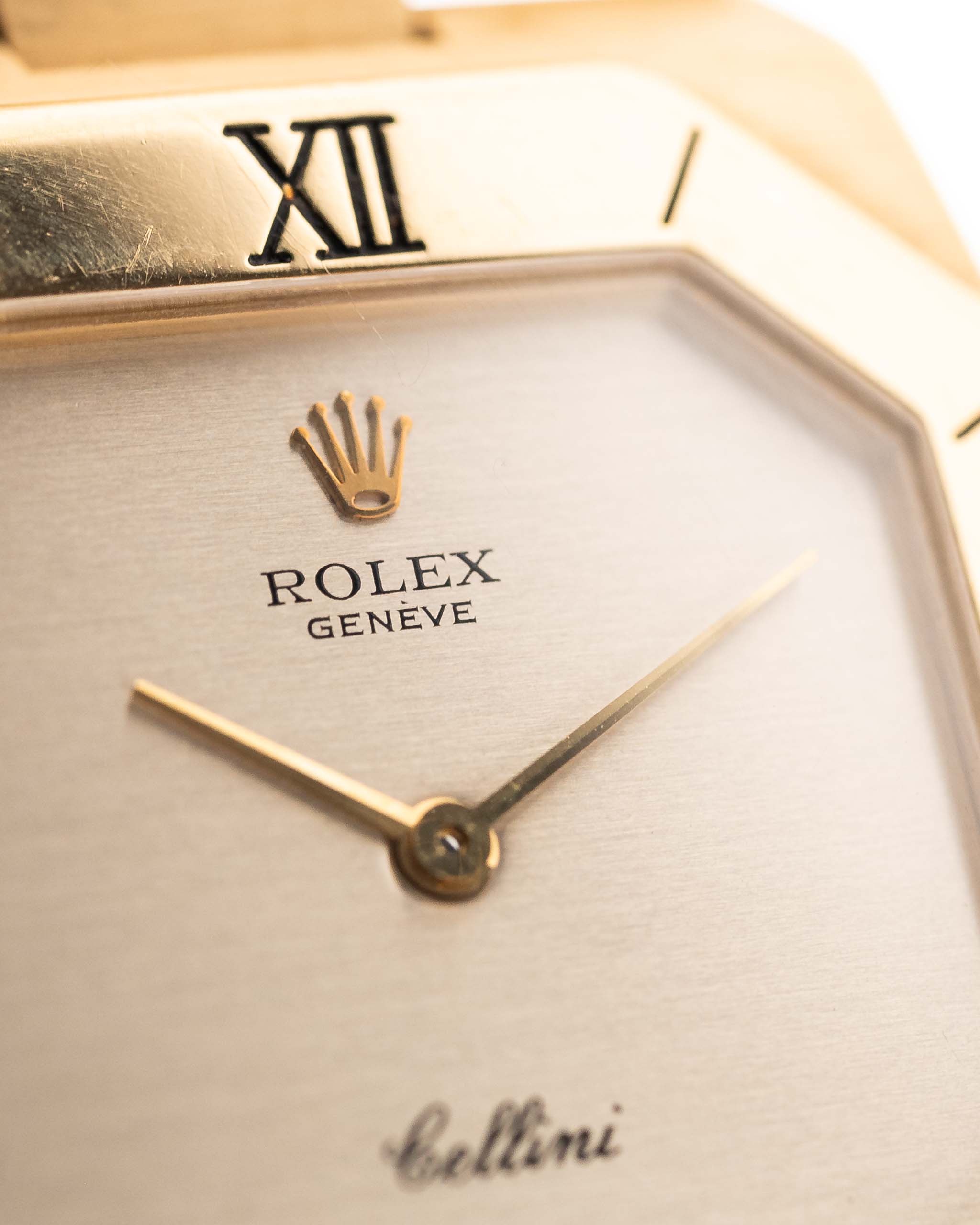 Closeup Photo of a Rolex Cellini 4350 Octagon 18k Silver Dial from 1981 on a wrist. 27mm in 18k Yellow Gold with Manual Wind Movement, Flawless Horizontal Brushed Dial and President Bracelet.