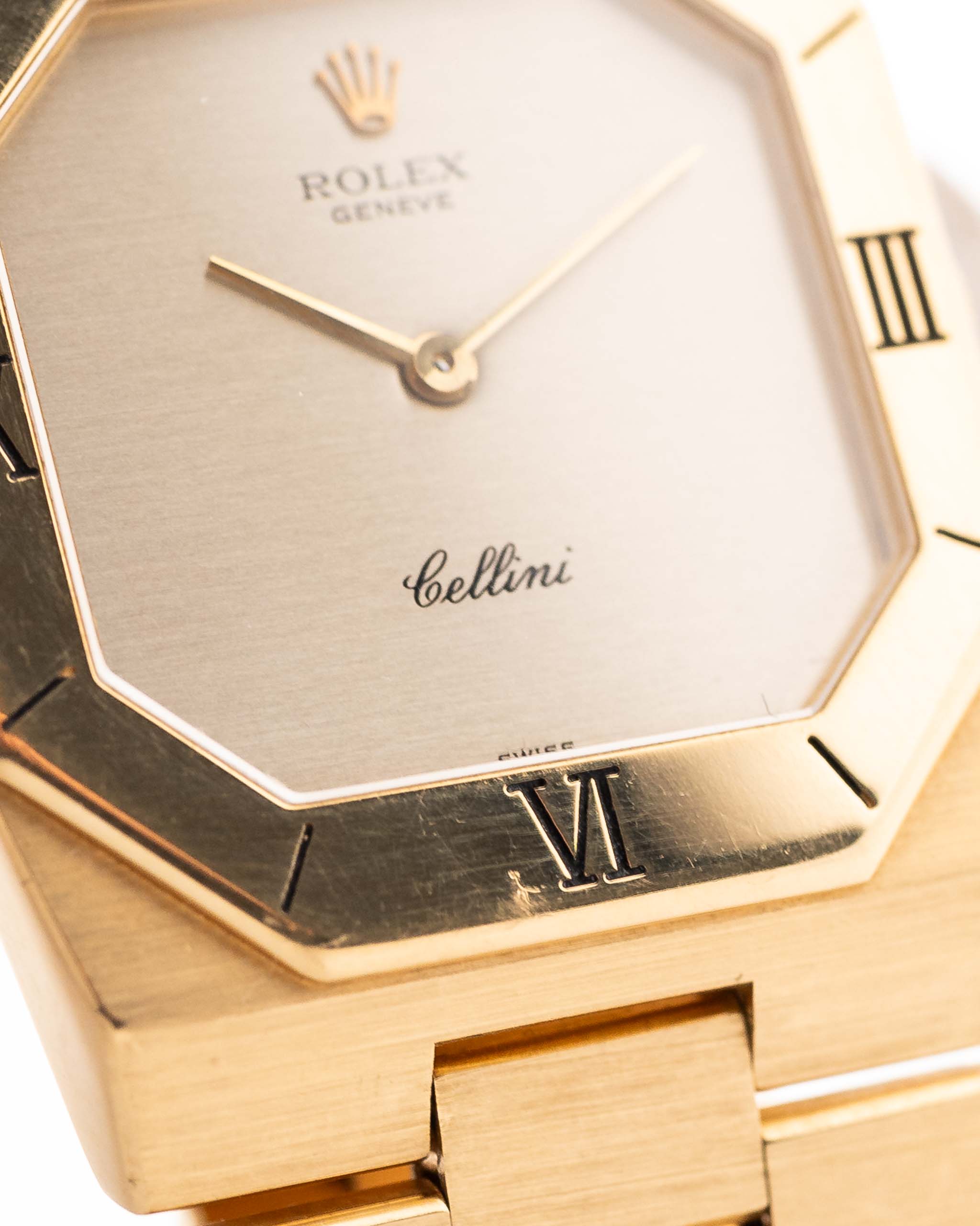 Closeup Photo of a Rolex Cellini 4350 Octagon 18k Silver Dial from 1981 on a wrist. 27mm in 18k Yellow Gold with Manual Wind Movement, Flawless Horizontal Brushed Dial and President Bracelet.