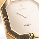 Closeup Photo of a Rolex Cellini 4350 Octagon 18k Silver Dial from 1981 on a wrist. 27mm in 18k Yellow Gold with Manual Wind Movement, Flawless Horizontal Brushed Dial and President Bracelet.