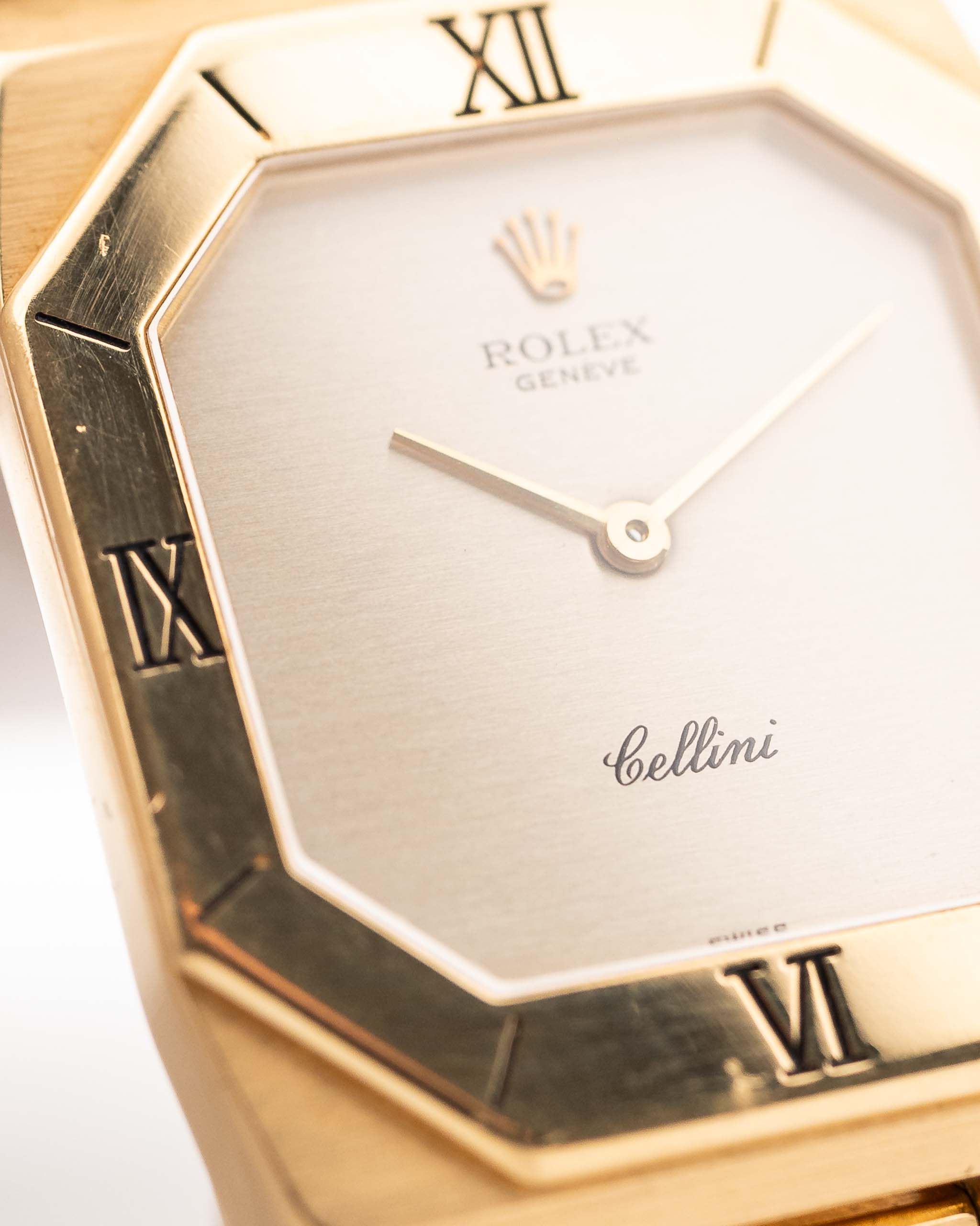 Closeup Photo of a Rolex Cellini 4350 Octagon 18k Silver Dial from 1981 on a wrist. 27mm in 18k Yellow Gold with Manual Wind Movement, Flawless Horizontal Brushed Dial and President Bracelet.