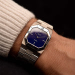 Vintage Rolex Cellini 4350 Octagon Blue Watch from 1983 on a wrist. 27mm with 18k White Gold Case, Royal Blue Dial, 18k White Gold President Bracelet and Manual-wound Caliber 1601.