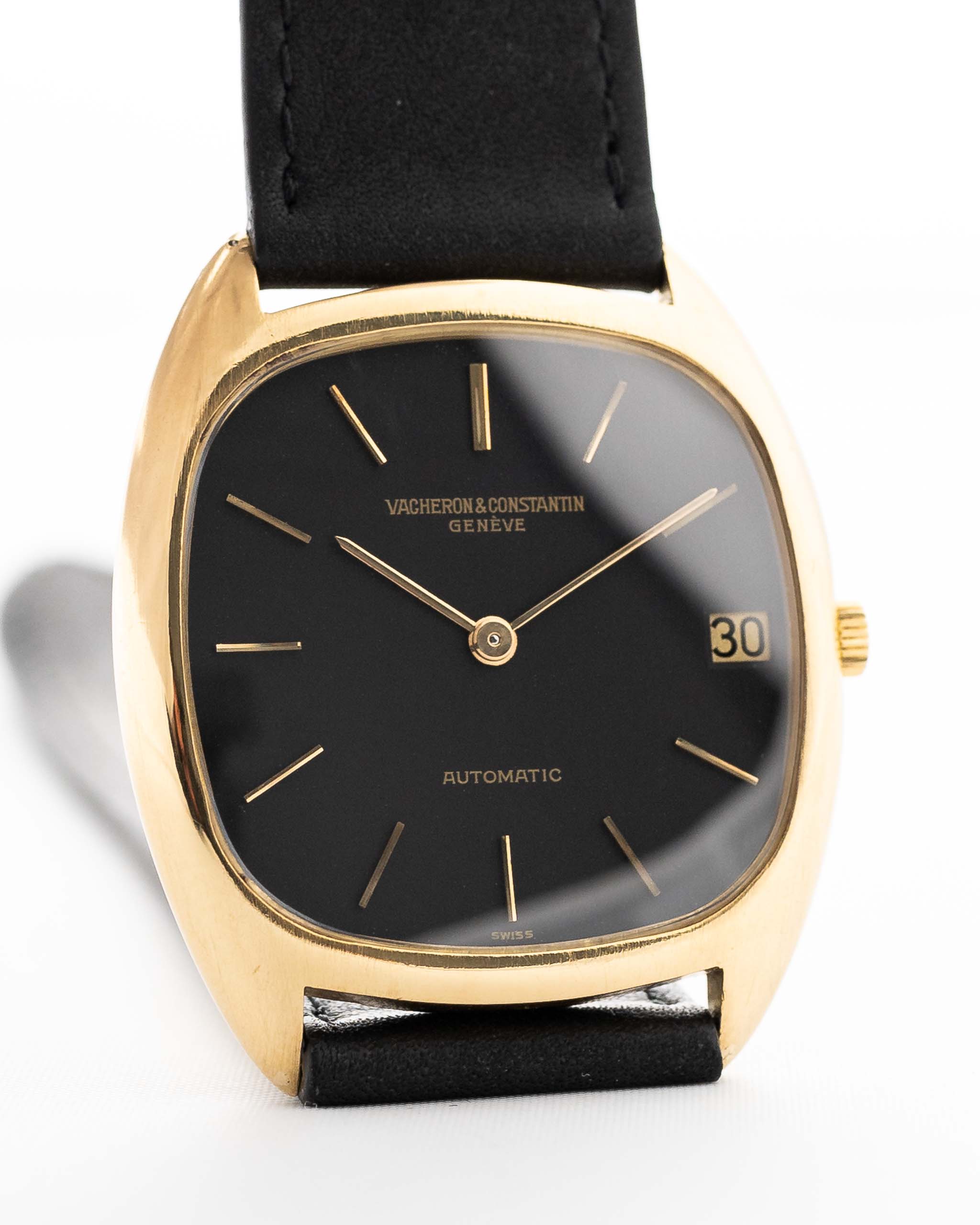 Vintage Vacheron Constantin 2020 Tonneau from the 1950s on a wrist. 18k Yellow Gold Case, Original matte black dial and black Leather strap.