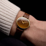 Piaget Uhr - Piaget Ellipse 9802 Tigerauge Zifferblatt 18k Gelbgoldgehäuseoriginal braunes Piaget Lederarmband aus den 1970er Jahren