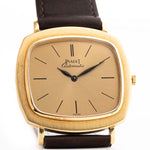 Orologio vintage Piaget TV 12432 Automatico 18k degli anni '70. 32,5 mm con cassa in oro giallo 18k, calibro automatico 12P1, quadrante dorato, lancette a foglia e cinturino in pelle.