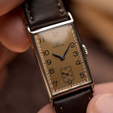 Vintage Omega Rectangular Art Deco watch Salmon from 1935.