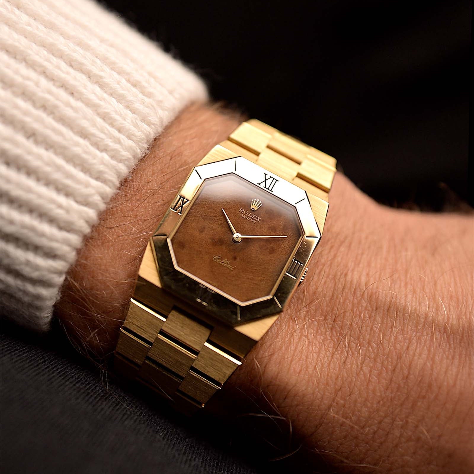 Vintage Rolex Cellini 4350 Watch Octagon Wood from 1981 on a wrist. 27mm in 18k Yellow Gold Case with Flawless Burl Wood Dial, Manual Wind Caliber 1601, Original 18k Rolex President Bracelet.