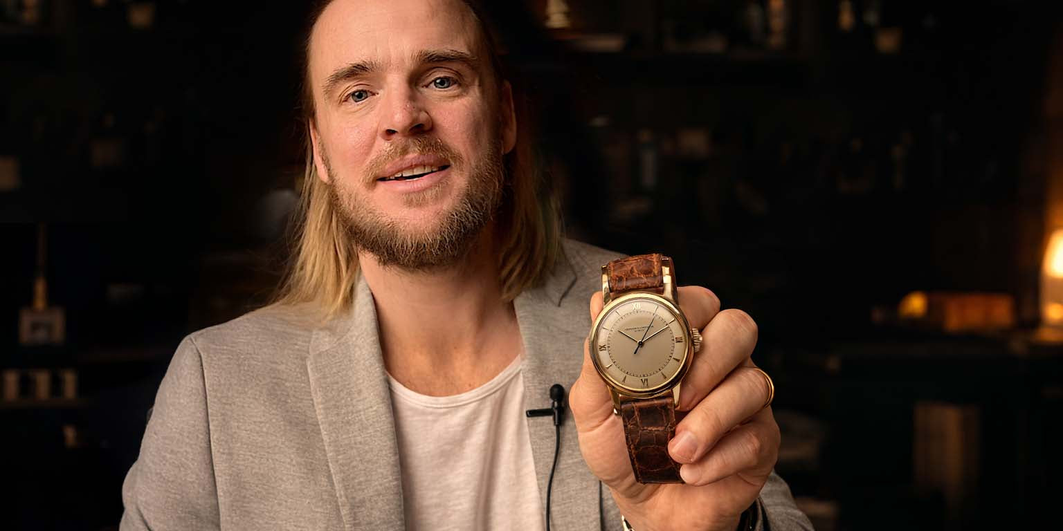Man holding a watch