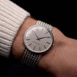Audemars Piguet 18k Calatrava with a 34mm 18k white gold case, reflective silver dial, and white gold bracelet