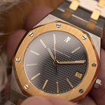 Vintage Audemars Piguet 4100SA Royal Oak Watch from the 1980s. Stainless Steel & 18k Yellow Gold with Rare flawless grey tapisserie dial, Two-Tone bracelet.