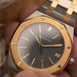 Vintage Audemars Piguet 4100SA Royal Oak Watch from the 1980s. Stainless Steel & 18k Yellow Gold with Rare flawless grey tapisserie dial, Two-Tone bracelet.