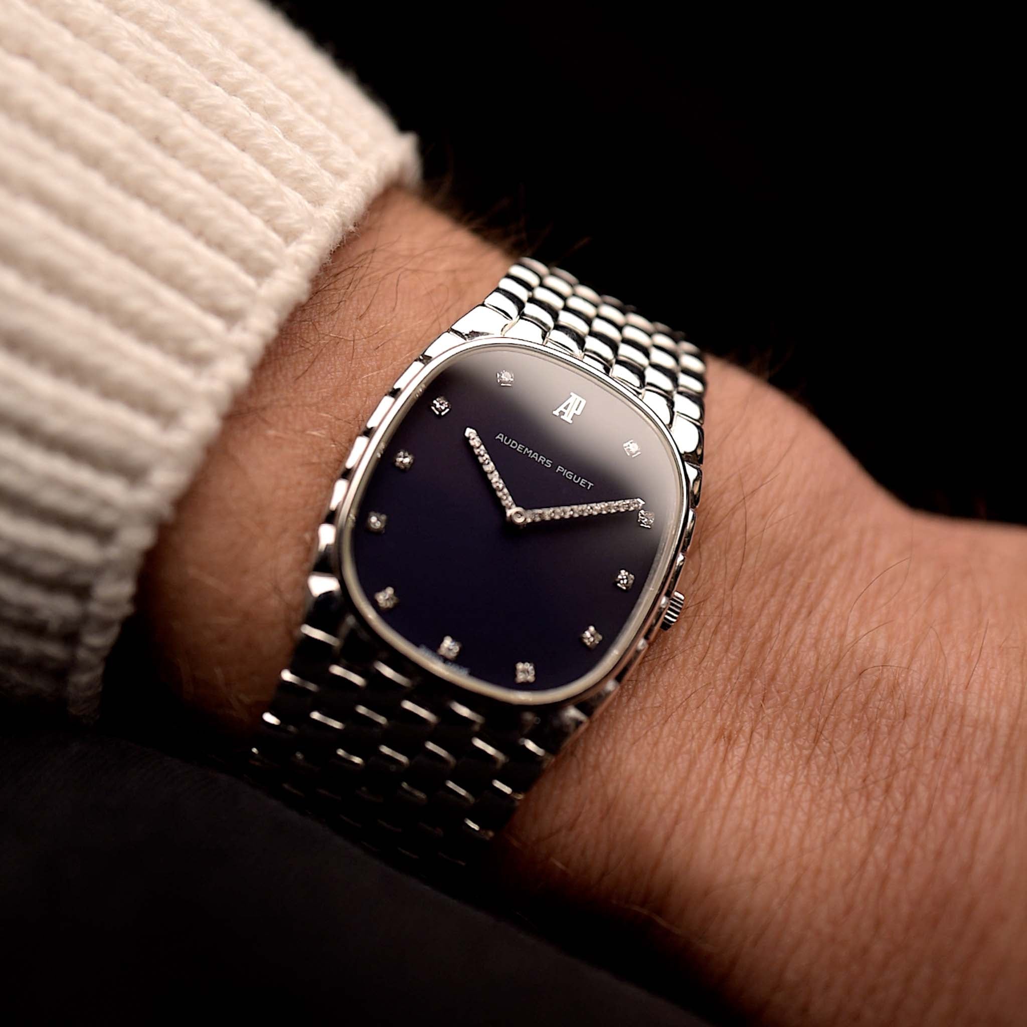 Photo of a Audemars Piguet Cobra 18k Diamond Blue from the 1990s on a wrist. 29mm in 18k White Gold with Manual wind movement, Deep blue dial, 32 Diamonds and Adjustable bracelet.