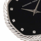 Closeup Photo of a Audemars Piguet Octagon Black Diamond from the 1970s on a wrist. 31.5mm case in 18k White Gold with Manual Wind Caliber 2003, Black Dial with Diamond Markers ad Adjustable 18k Bracelet.