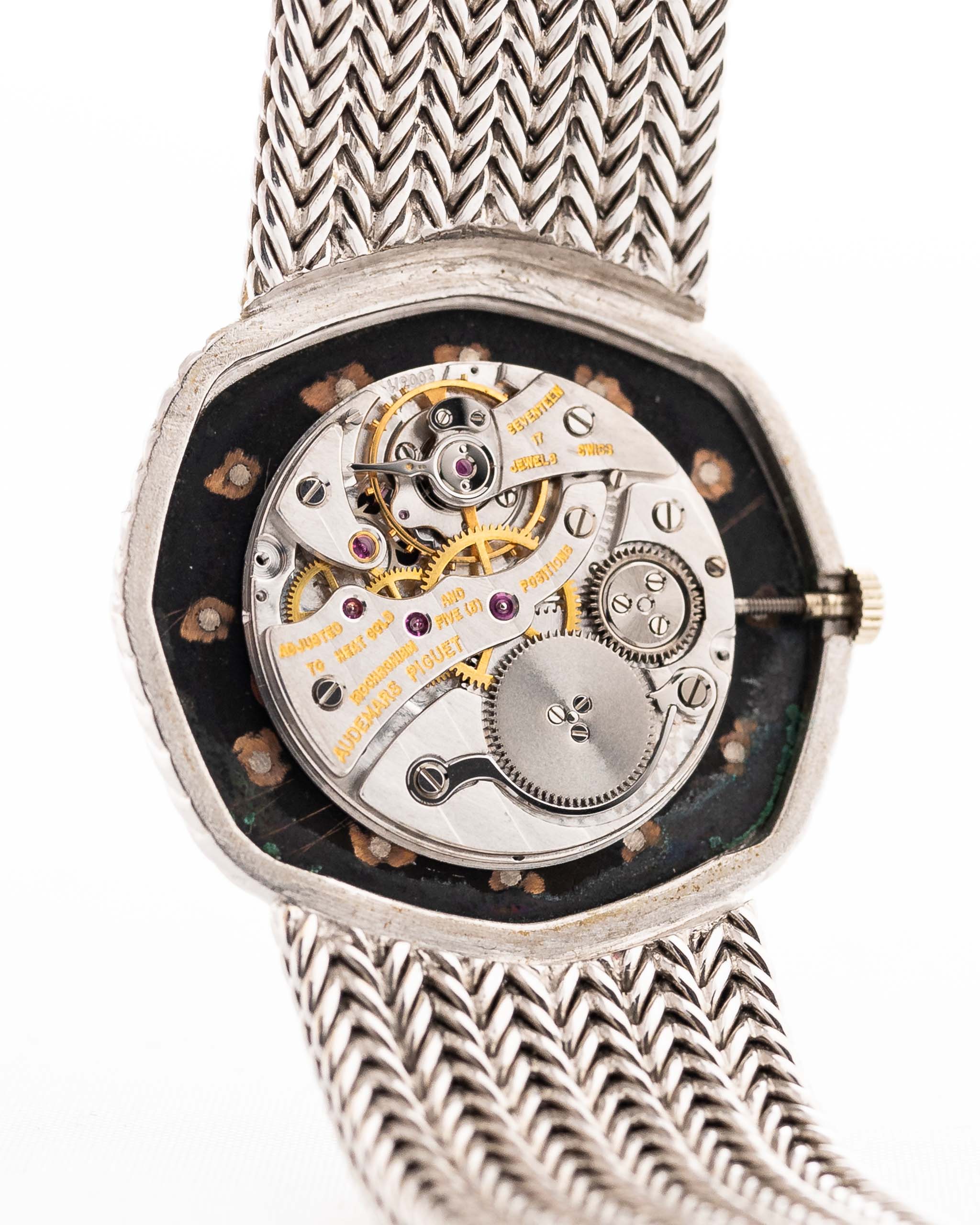 Closeup Photo of a Audemars Piguet Octagon Movement Black Diamond from the 1970s on a wrist. 31.5mm case in 18k White Gold with Manual Wind Caliber 2003, Black Dial with Diamond Markers ad Adjustable 18k Bracelet.