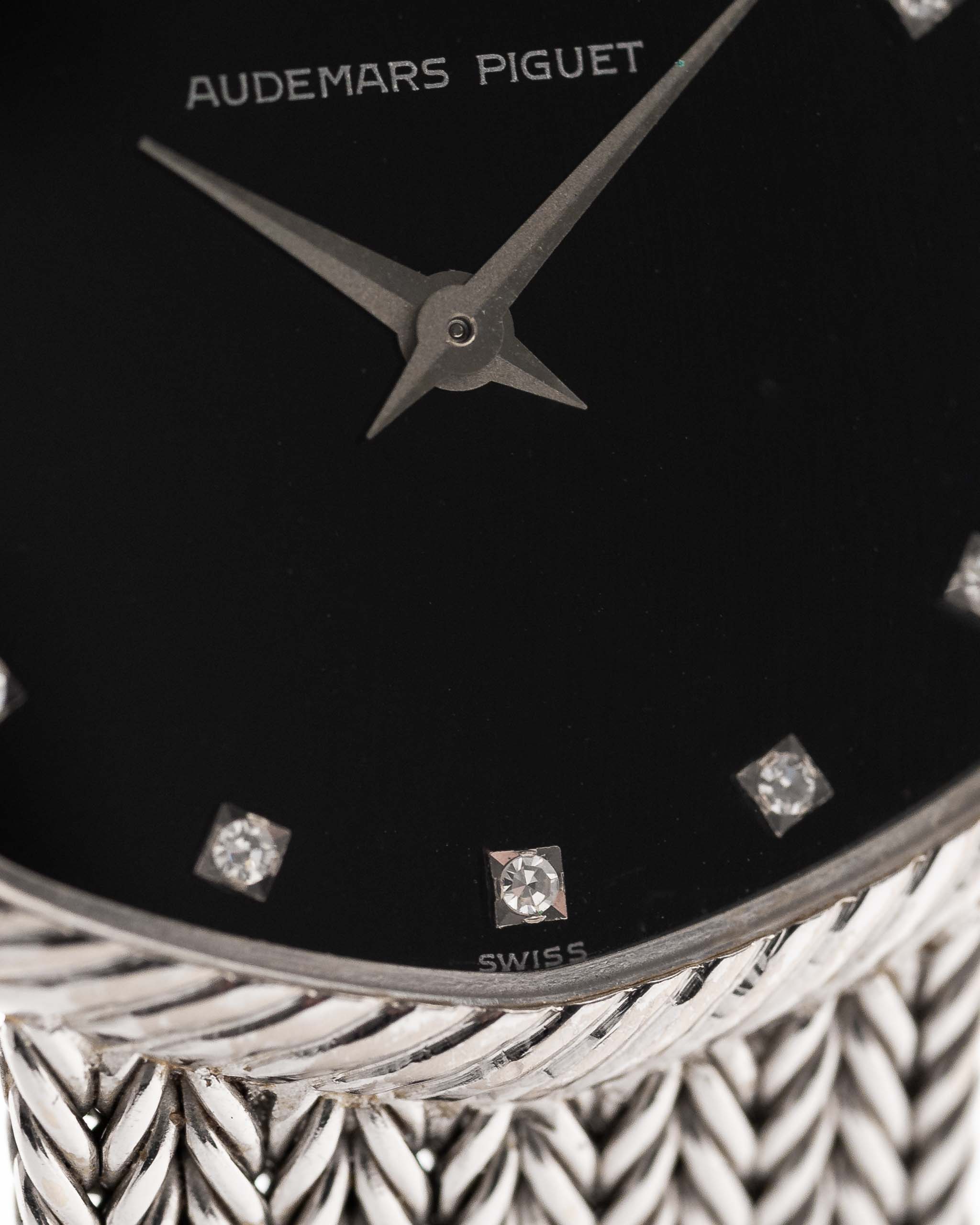 Closeup Photo of a Audemars Piguet Octagon Black Diamond from the 1970s on a wrist. 31.5mm case in 18k White Gold with Manual Wind Caliber 2003, Black Dial with Diamond Markers ad Adjustable 18k Bracelet.