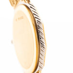 Closeup Photo of a Audemars Piguet Octagon Two Tone 18k from the 1980s. 30mm with 18k Yellow Gold Case, Golden Aventurine Dial, Manual Wind Movement and Yellow Gold Bracelet.