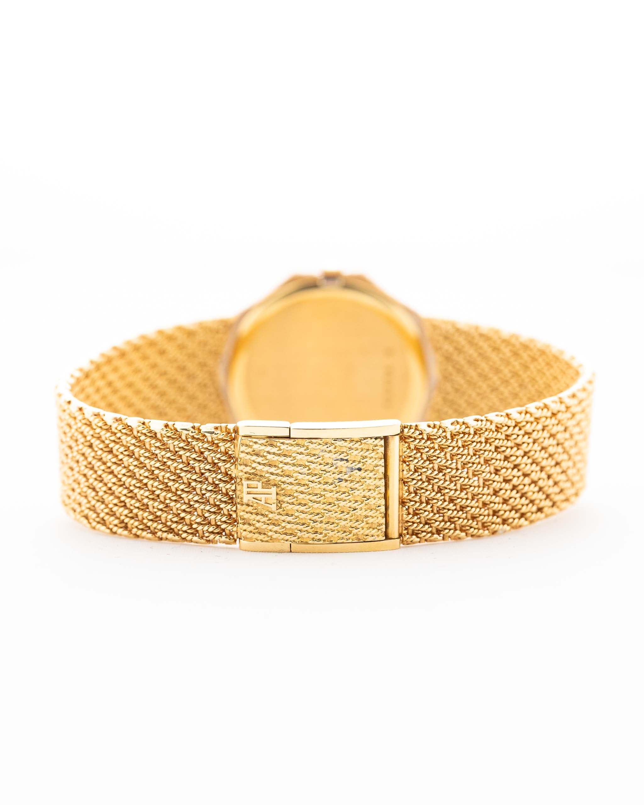 Photo of a Audemars Piguet Octagon Two Tone 18k bracelet from the 1980s. 30mm with 18k Yellow Gold Case, Golden Aventurine Dial, Manual Wind Movement and Yellow Gold Bracelet.