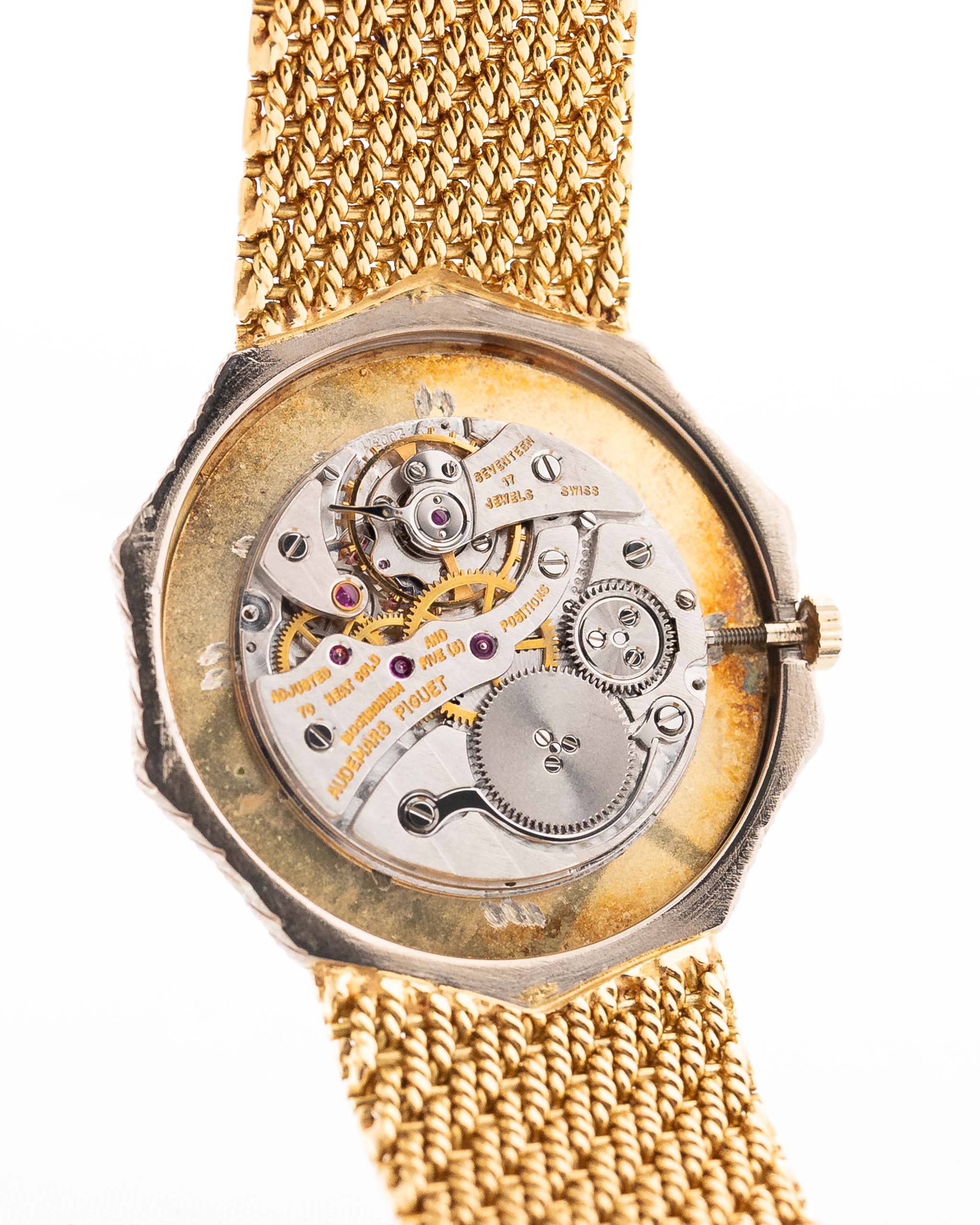 Closeup Photo of a Audemars Piguet Octagon Movement Two Tone 18k from the 1980s. 30mm with 18k Yellow Gold Case, Golden Aventurine Dial, Manual Wind Movement and Yellow Gold Bracelet.