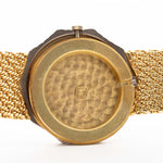 Closeup Photo of a Audemars Piguet Octagon Two Tone 18k from the 1980s. 30mm with 18k Yellow Gold Case, Golden Aventurine Dial, Manual Wind Movement and Yellow Gold Bracelet.