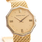 Closeup Photo of a Audemars Piguet Octagon Two Tone 18k from the 1980s. 30mm with 18k Yellow Gold Case, Golden Aventurine Dial, Manual Wind Movement and Yellow Gold Bracelet.