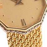 Closeup Photo of a Audemars Piguet Octagon Two Tone 18k from the 1980s. 30mm with 18k Yellow Gold Case, Golden Aventurine Dial, Manual Wind Movement and Yellow Gold Bracelet.