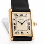 Closeup of a Vintage Cartier Tank Louis 78086 Paris Dial from the 1970s. 23x30mm with 18k Yellow Gold Case, Manual Wind Movement, Flawless Ivory Dial, Hands and Leather Strap.