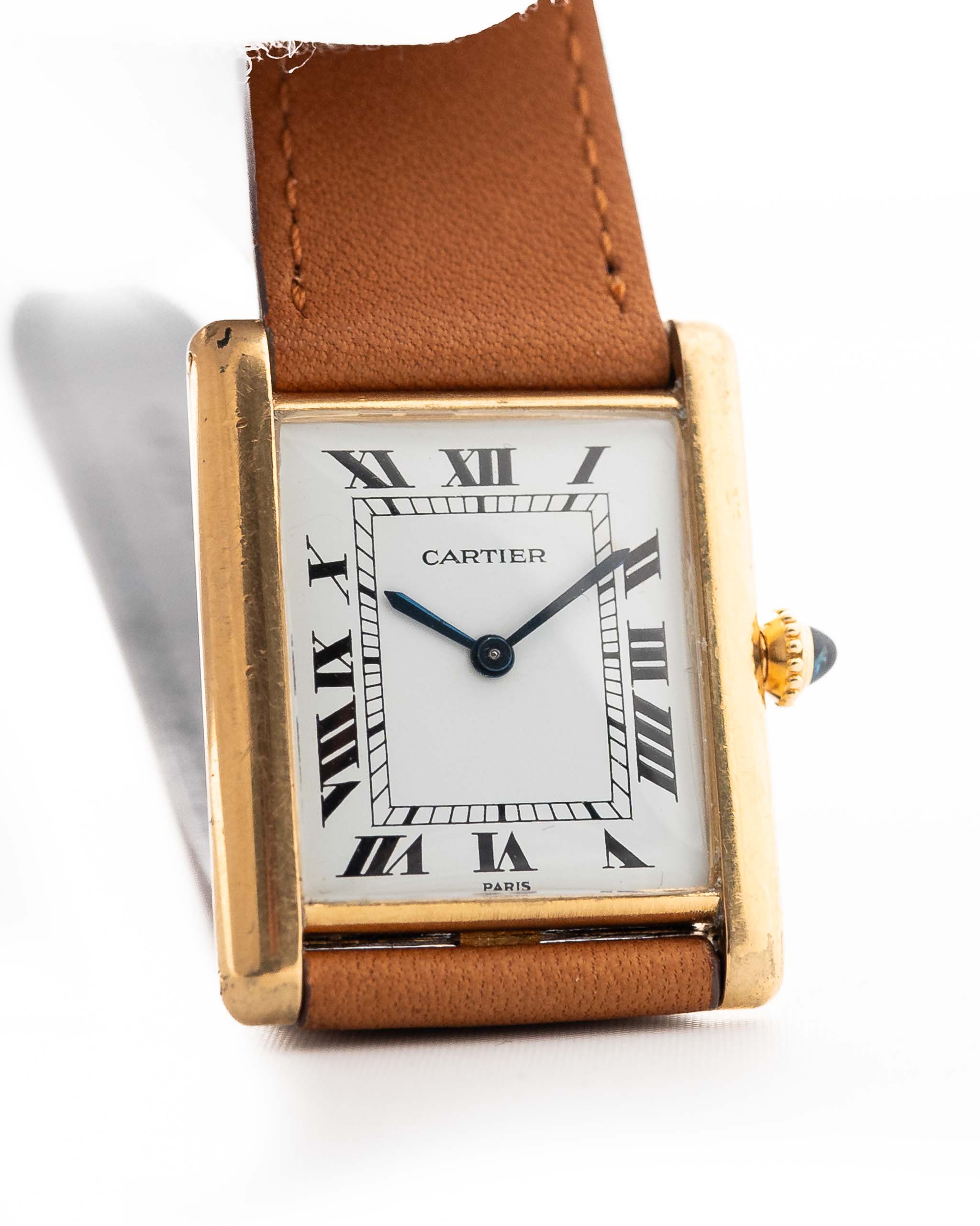 Cartier Tank Louis 96019 Paris Ref 96019 from the 1970s. 18k Yellow Gold with Manual movement, Original white dial and Original Leather strap.